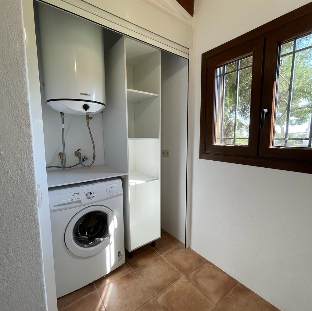 Laundry room with electrical shutter